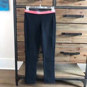 Lululemon Skinny Yoga Pant. Black & coral, size 4